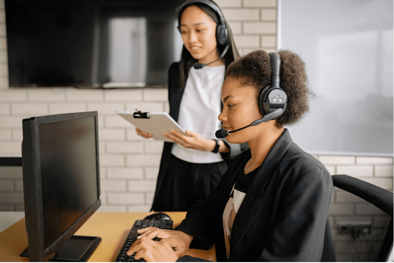 Team collaborating at a computer